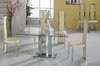Large clear glass dining table and 6 cream chairs