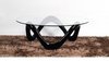 Round glass coffee table with black high gloss base
