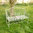 Cream metal garden bench