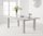 Extending light grey high gloss dining table and 8 chairs