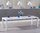 Extra large white high gloss dining table and 10 grey chairs