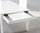 Extending white high gloss dining table and 12 black chairs