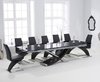 210-300cm Black glass dining table and 12 black z chairs