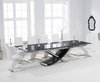 210-300cm Black glass dining table and 10 white z chairs