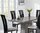 Natural grey marble dining table and 6 black gloss chairs