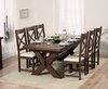Dark oak dining table and 8 cream leather chairs