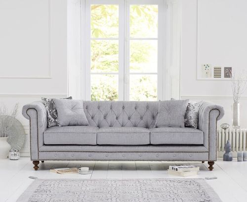 Light grey velvet 3 seater sofa with stud detail